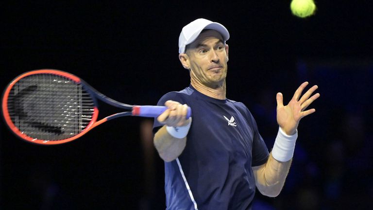 Britain&#39;s Andy Murray returns the ball to Germany&#39;s Yannick Hanfmann during their first round match at the Swiss Indoors tennis tournament at the St. Jakobshalle in Basel, Switzerland, on Monday, Oct. 23, 2023. (Georgios Kefalas/Keystone via AP)