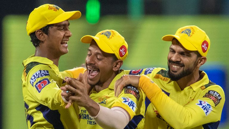 Chennai Super Kings&#39; players congratulate Chennai Super Kings&#39; Subhranshu Senapati, centre for running out Gujarat Titans&#39; Darshan Nalkande