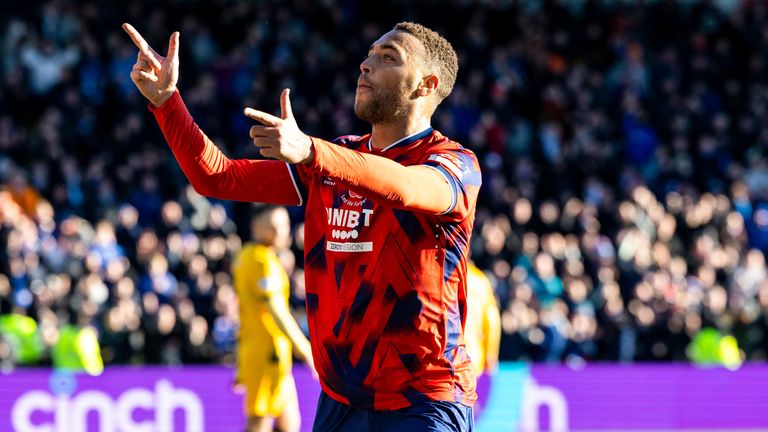 Rangers&#39; Cyriel Dessers celebrates after scoring to make it 1-0 at Livingston