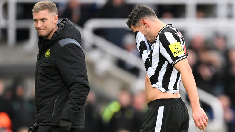 Fabian Schar leaves the pitch after picking up an injury