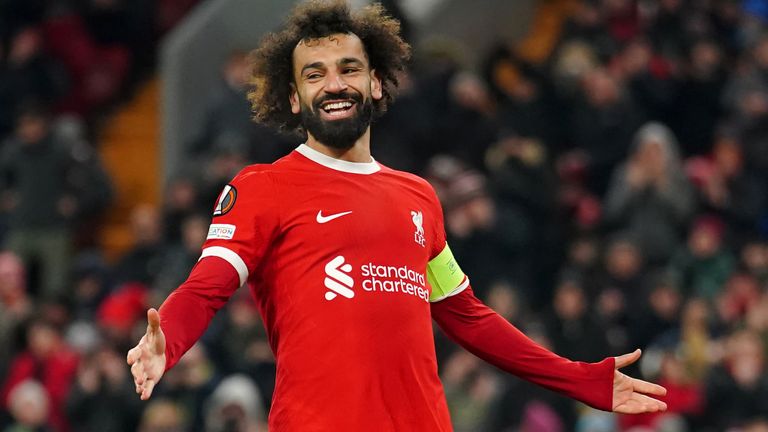 Liverpool's Mohamed Salah celebrates scoring their side's third goal of the game from the penalty spot