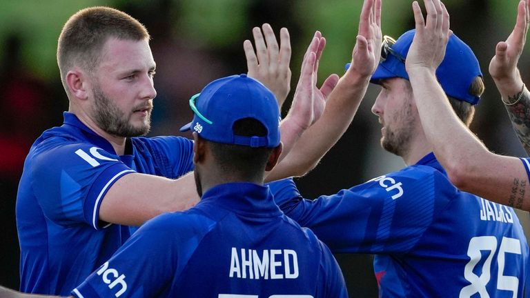 England&#39;s Gus Atkinson..celebrates taking the wicket of West Indies&#39; Shimron Hetmyer..during the first ODI cricket match at Sir Vivian Richards Stadium in North Sound, Antigua and Barbuda, Sunday, Dec. 3, 2023. (AP Photo/Ricardo Mazalan) 