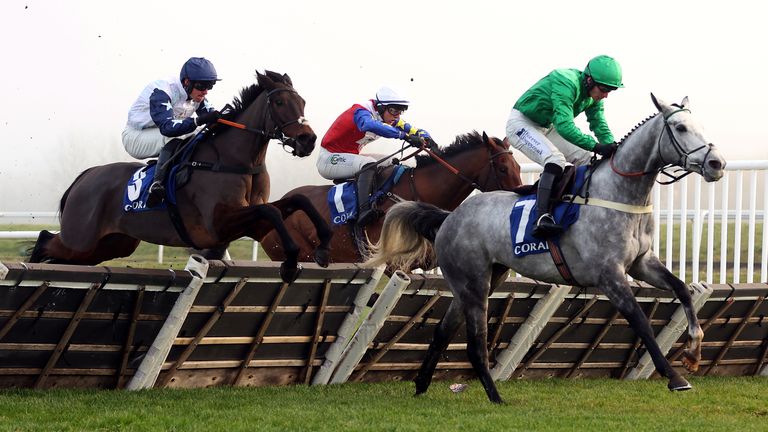 Hansard (white cap) comes through to win the Gerry Feilden at Newbury