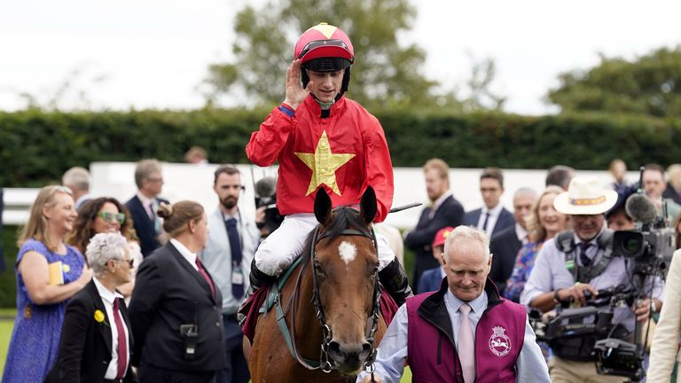 Jason Hart salutes the crowd at Goodwood after Highfield Princess&#39; victory