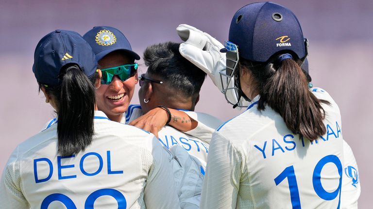 India celebrate a wicket against England (Associated Press)