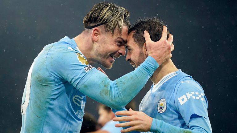 Manchester City&#39;s Jack Grealish celebrates with Bernardo Silva after scoring his side&#39;s third goal