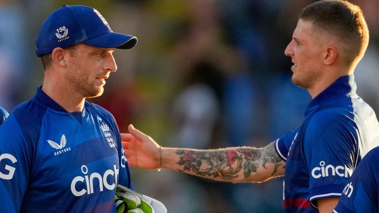 England&#39;s captain Jos Buttler..ant teammates walk off the field after losing against West Indies by four wicket their first ODI cricket match at Sir Vivian Richards Stadium in North Sound, Antigua and Barbuda, Sunday, Dec. 3, 2023. (AP Photo/Ricardo Mazalan)