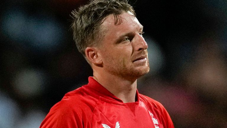 England&#39;s captain Jos Buttler shows the ball to the umpire during the first T20 cricket match against West Indies at Kensington Oval in Bridgetown, Barbados, Tuesday, Dec. 12, 2023. (AP Photo/Ricardo Mazalan)