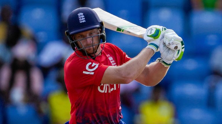 England&#39;s captain Jos Buttler plays a shot from the bowling of West Indies&#39; Akeal Hosein..during the third T20 cricket match at National Cricket Stadium in Saint George&#39;s, Grenada, Saturday, Dec. 16, 2023. (AP Photo/Ricardo Mazalan)