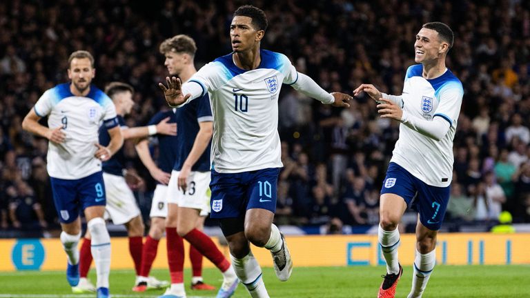 Jude Bellingham celebrates with Phil Foden after scoring to make it 2-0 