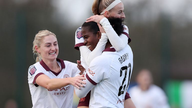 Manchester City&#39;s Khadija Shaw celebrates scoring her side&#39;s first goal of the game with Chloe Kelly and Laura Coombs