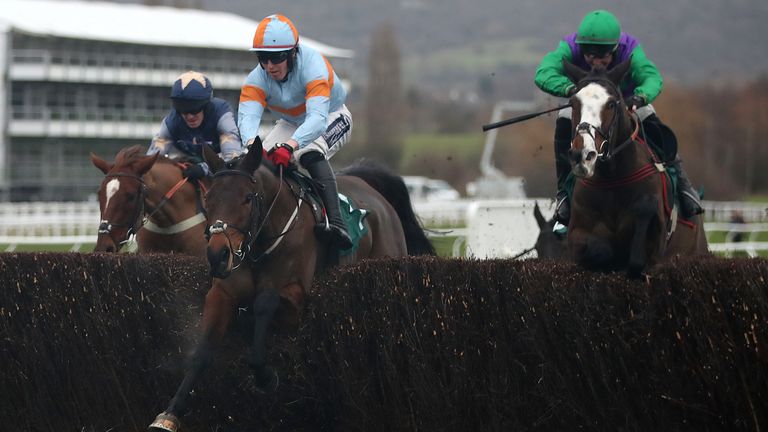 La Malmason ridden by Keith Donoghue jumps the last before winning the Cheltenham Racecourse Food Bank Collection Mares&#39; Handicap Chase during day one of the The Christmas Meeting at Cheltenham