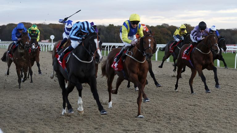 Onesmoothoperator (front left) ridden by jockey Ben Robinson on their way to winning the Virgin Bet November Handicap at Newcastle