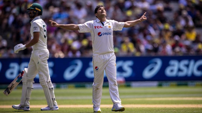 Pakistan&#39;s Mir Hamza (2-51) celebrates the wicket of Australia&#39;s Mitchell Starc (nine)