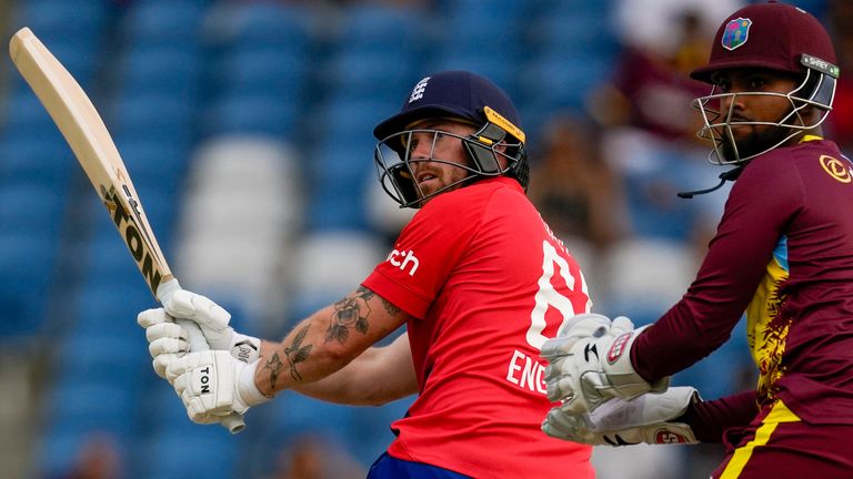 England&#39;s Phil Salt..plays a shot for four runs against West Indies during the fourth T20 cricket match at Brian Lara Stadium in Tarouba, Trinidad and Tobago, Tuesday, Dec. 19, 2023. (AP Photo/Ricardo Mazalan)