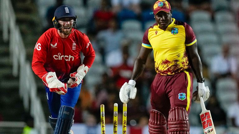 England&#39;s wicket keeper Phil Salt..celebrates the dismissal of West Indies&#39; captain Rovman Powell during the fourth T20 cricket match at Brian Lara Stadium in Tarouba, Trinidad and Tobago, Tuesday, Dec. 19, 2023. (AP Photo/Ricardo Mazalan)