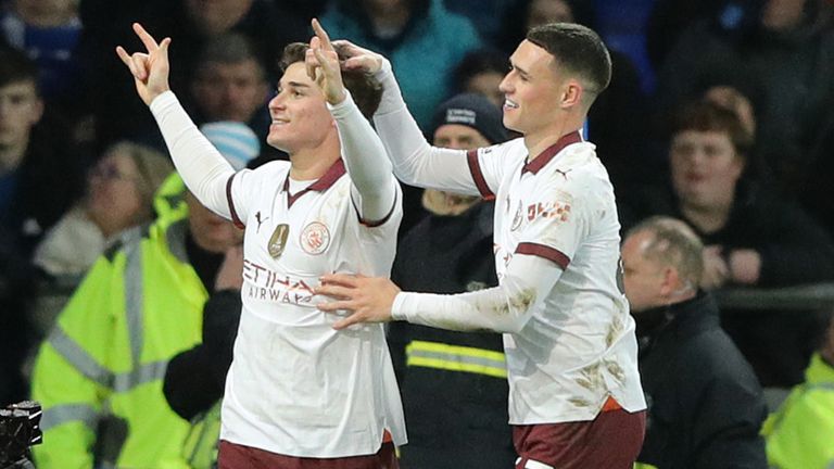 Goalscorers Julian Alvarez and Phil Foden celebrate at Goodison Park