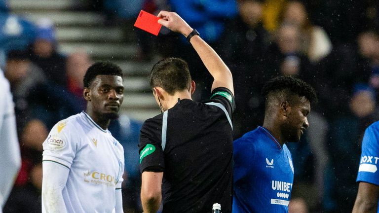 Referee Kevin Clancy upgrades Jose Cifuentes&#39; yellow card to a red card after a VAR check 