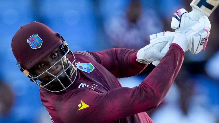 West Indies&#39; Romario Shepherd..plays a shot against England during the first ODI cricket match at Sir Vivian Richards Stadium in North Sound, Antigua and Barbuda, Sunday, Dec. 3, 2023. (AP Photo/Ricardo Mazalan)