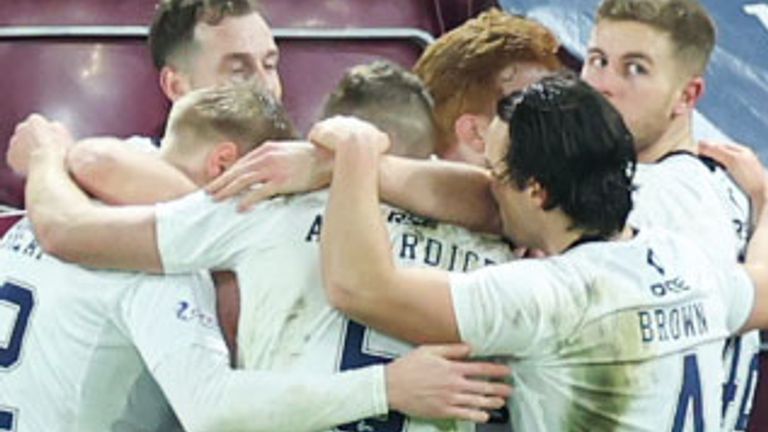 EDINBURGH, SCOTLAND - DECEMBER 30: Ross County players celebrates after they go 1-0 up through an own goal from Hearts&#39; Alex Cochrane during a cinch Premiership match between Heart of Midlothian and Ross County at Tynecastle Park, on December 30, 2023, in Edinburgh, Scotland. (Photo by Roddy Scott / SNS Group)