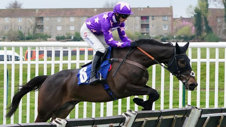 Rubaud ridden by jockey Harry Cobden on their way to winning the Coral Scottish Champion Hurdle
