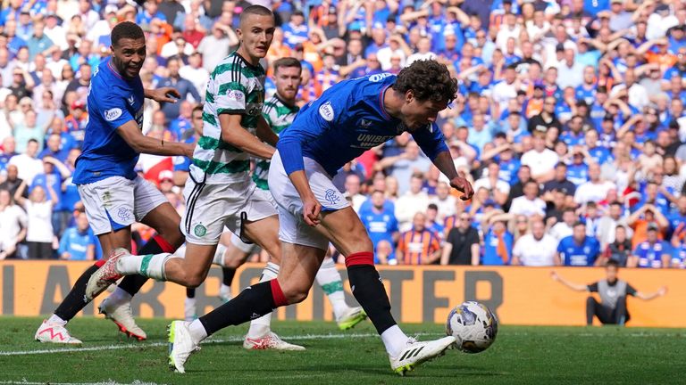 Sam Lammers shoots wide after rounding Celtic goalkeeper Joe Hart