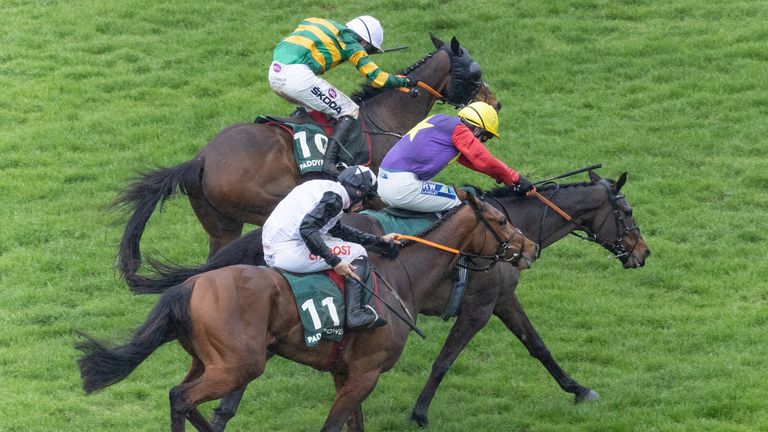 Jockey, Mark Walsh on Sire Du Berlais overtakes Rex Dingle on Dashel Drasher with Davy Russell on Teahupoo close behind in the Paddy Power Stayers Hurdle 