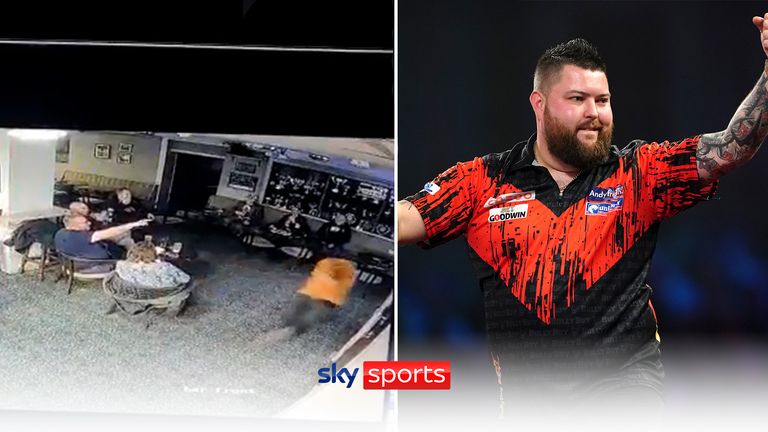 This fan couldn't contain his excitement as Michael Smith hit a stunning nine-darter in the World Darts Championship Final (credit: @EagleDarts1).