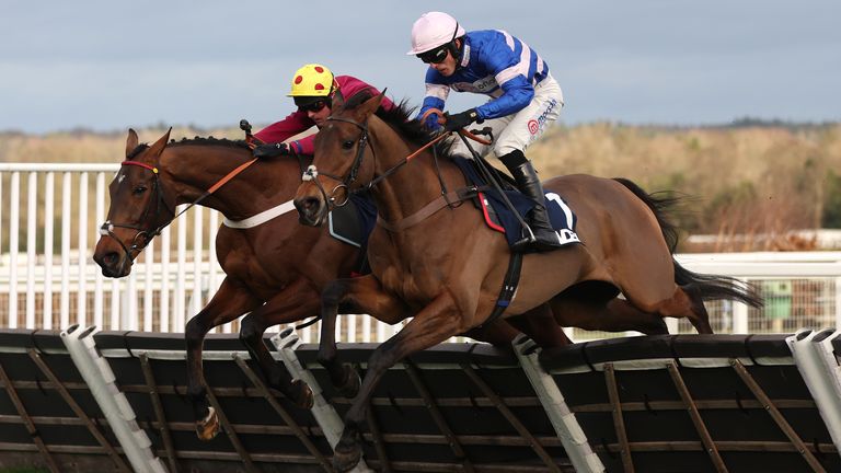 Welcom To Cartries ridden by Harry Cobden (right) goes on to win The Howden Maiden Hurdle on day one of the Howden Christmas Racing Weekend at Ascot 