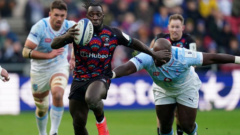 Bristol Bears' Gabriel Ibitoye (left) is tackled by Vodacom Bulls' Khutha Mchunu