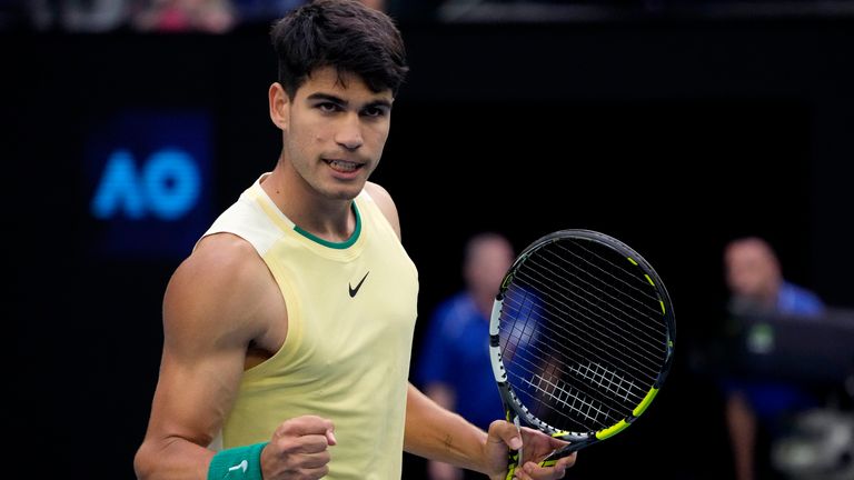 Carlos Alcaraz of Spain celebrates after defeating Lorenzo Sonego of Italy in their second round match at the Australian Open tennis championships at Melbourne Park, Melbourne, Australia, Thursday, Jan. 18, 2024. (AP Photo/Andy Wong)