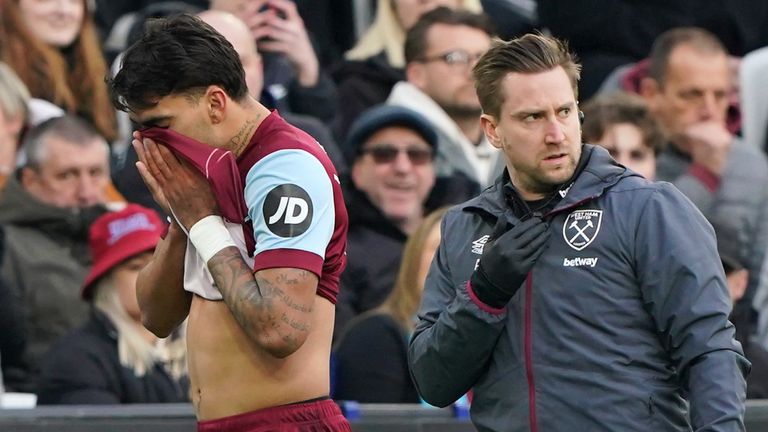 Lucas Paqueta leaves the field after picking up an early injury against Bristol City