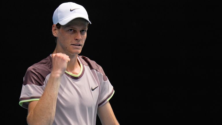 Italy&#39;s Jannik Sinner reacts after defeating Botic van de Zandschulp of the Netherlands in their first round match at the Australian Open tennis championships at Melbourne Park, Melbourne, Australia, Sunday, Jan. 14, 2024. (AP Photo/Andy Wong)