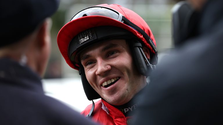 Johnny Burke smiles as he discusses his winning ride on Crambo