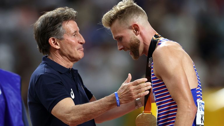 World Athletics president Seb Coe congratulates Kerr on his gold medal at the World Championships