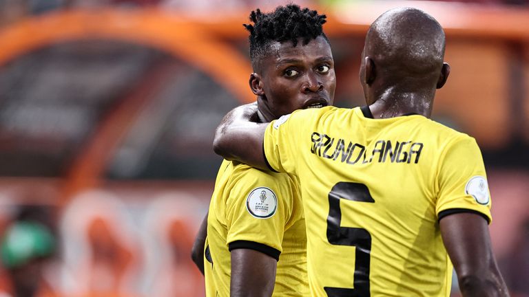 Mozambique&#39;s forward #19 Witi (L) celebrates scoring his team&#39;s first goal during the Africa Cup of Nations (CAN) 2024 group B football match between Egypt and Mozambique at the Felix Houphouet-Boigny Stadium in Abidjan on January 14, 2024. (Photo by FRANCK FIFE / AFP)