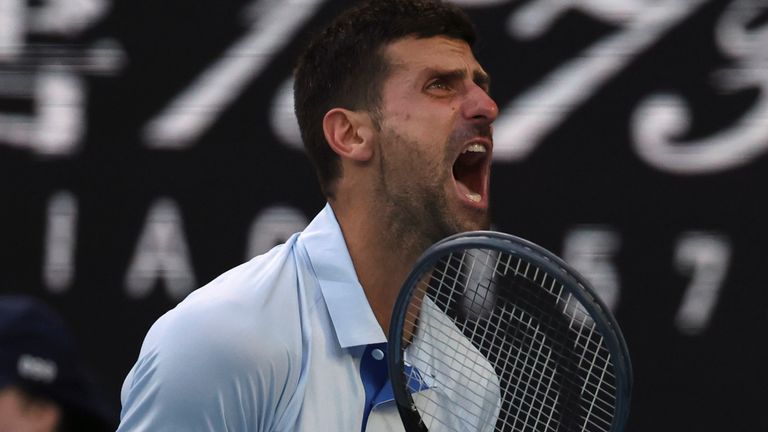 Novak Djokovic of Serbia reacts after losing a point to Taylor Fritz of the U.S. during their quarterfinal match at the Australian Open tennis championships at Melbourne Park, Melbourne, Australia, Tuesday, Jan. 23, 2024. (AP Photo/Asanka Brendon Ratnayake)