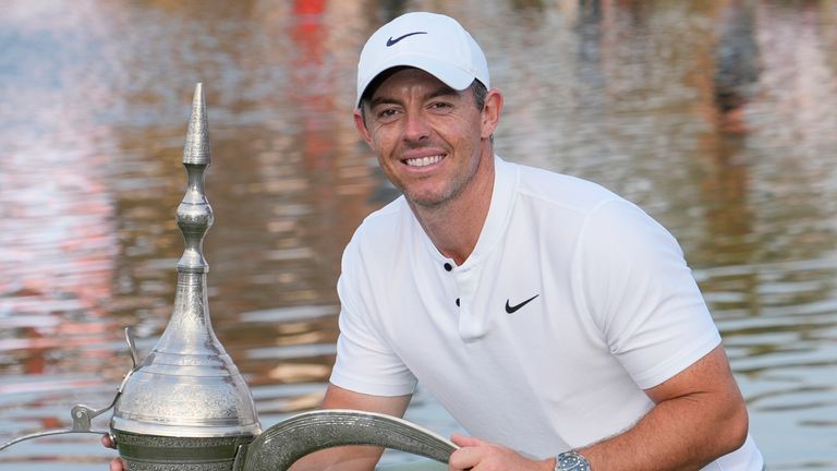 Rory McIlroy of Northern Ireland poses with his trophy after he won the final round of the Hero Dubai Desert Classic golf tournament, in Dubai, United Arab Emirates, Sunday, Jan. 21, 2024. (AP Photo/Kamran Jebreili)