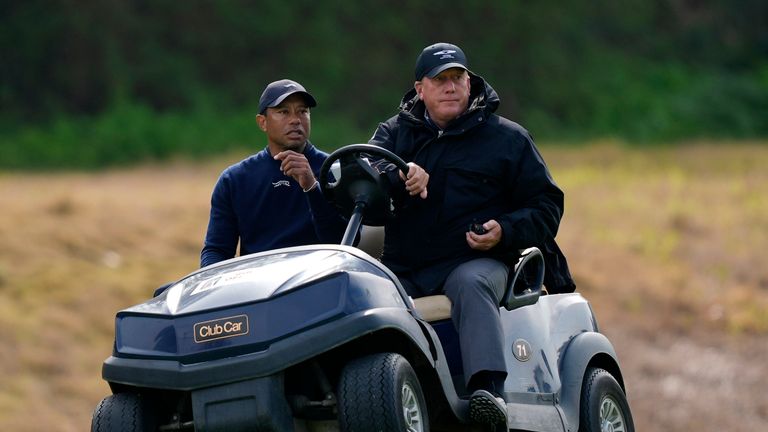 Tiger Woods is driven off the course after withdrawing during the second round of the Genesis Invitational golf tournament at Riviera Country Club Friday, Feb. 16, 2024, in the Pacific Palisades area of Los Angeles. (AP Photo/Ryan Sun)