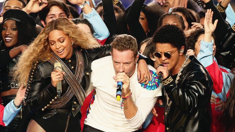 Beyonce, Chris Martin of Coldplay and Bruno Mars perform onstage during the Pepsi Super Bowl 50 Halftime Show