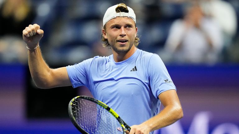 Alexandre Muller, of France, reacts during a match against Novak Djokovic, of Serbia, at the first round of the U.S. Open tennis championships, Tuesday, Aug. 29, 2023, in New York. (AP Photo/Frank Franklin II)