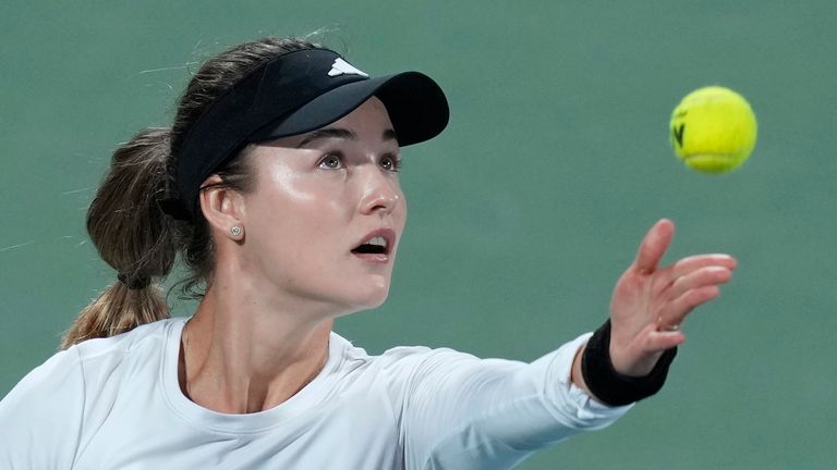 Anna Kalinskaya serves to Jasmine Paolini of Italy during the final match of the Dubai Duty Free Tennis Championships in Dubai, United Arab Emirates, Saturday, Feb. 24, 2024. (AP Photo/Kamran Jebreili)