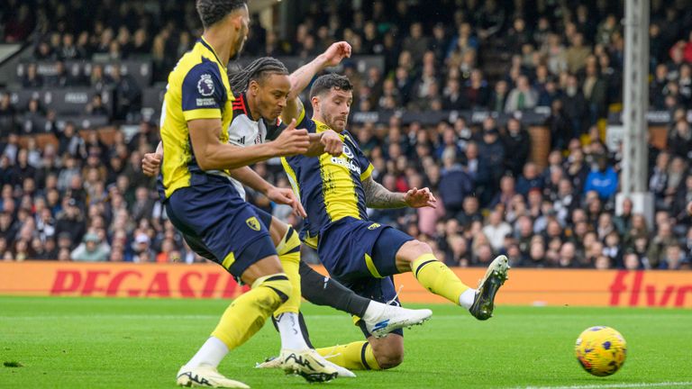 Fulham's Bobby Reid (centre) scores the opening goa