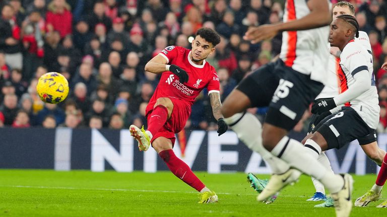 Liverpool's Luis Diaz takes a shot at goal during the English Premier League soccer match between Liverpool and Luton Town, at Anfield stadium in Liverpool, England, Wednesday, Feb. 21, 2024. (AP Photo/Jon Super)