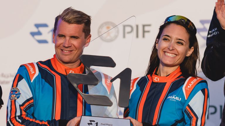 Anna Glennon and Erik Stark hold second place trophy. 