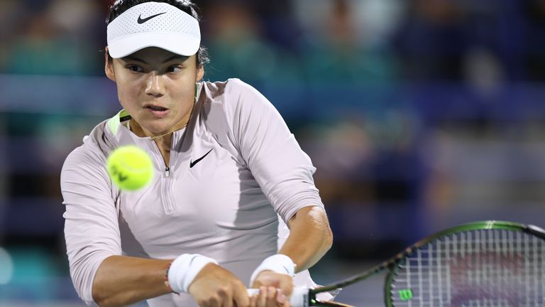 Emma Raducanu of Great Britain plays a shot against Marie Bouzkova