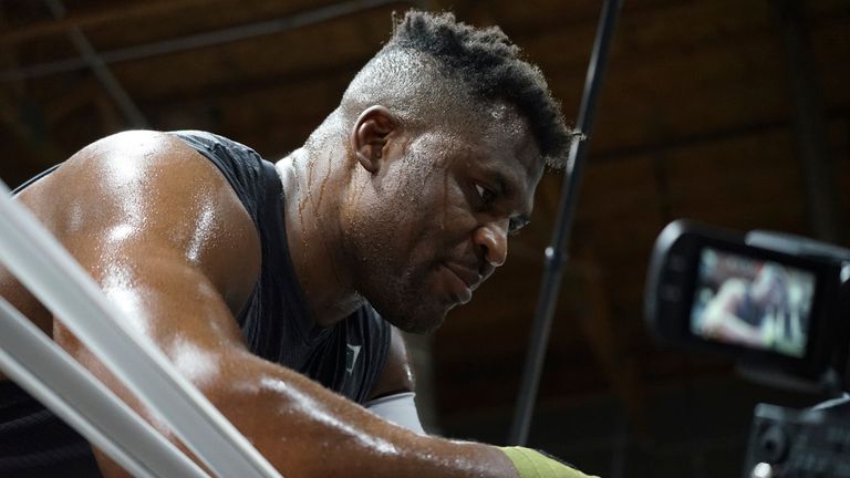 LAS VEGAS, NV - SEPTEMBER 26: Francis Ngannou trains with coaches Mike Tyson and Dewey Cooper at the Tyson Fury vs. Francis Ngannou open workout on September 26, 2023, at Ngannou&#39;s private gym in Las Vegas, NV. (Photo by Amy Kaplan/Icon Sportswire) (Icon Sportswire via AP Images)


