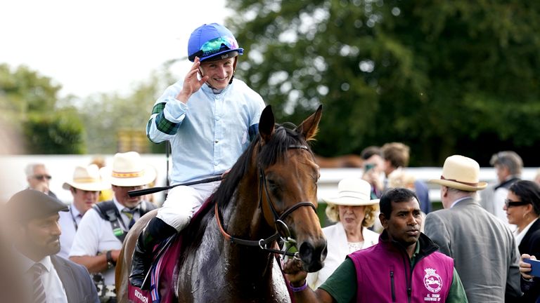 Tom Marquand salutes the crowd after Quickthorn's victory in the Goodwood Cup