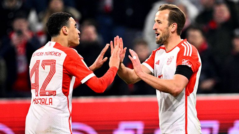 Harry Kane celebrates with Jamal Musiala