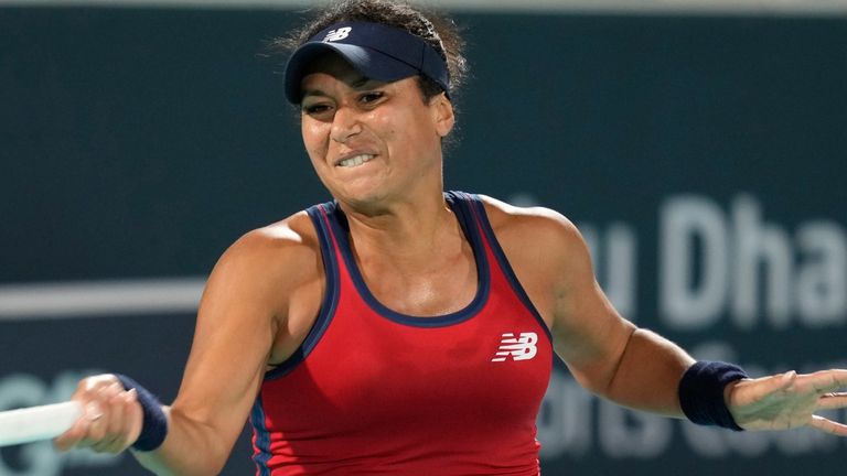 Heather Watson of Britain returns the ball to Veronika Kudermetova during a match of the Mubadala Abu Dhabi Open tennis tournament, in Abu Dhabi, United Arab Emirates, Tuesday, Feb. 6, 2024. (AP Photo/Kamran Jebreili)